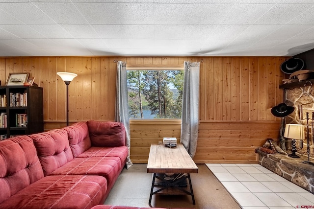 tiled living room with wooden walls