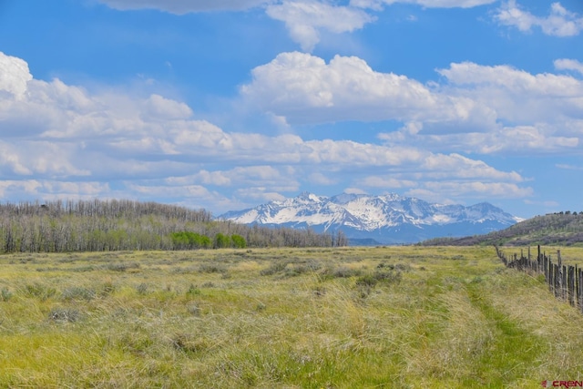 property view of mountains featuring a rural view