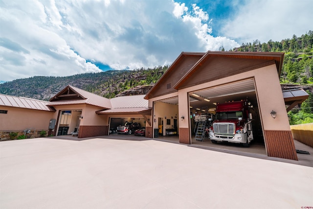 exterior space featuring a mountain view