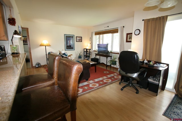 office area with light hardwood / wood-style flooring