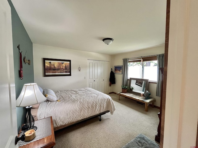 carpeted bedroom featuring a closet