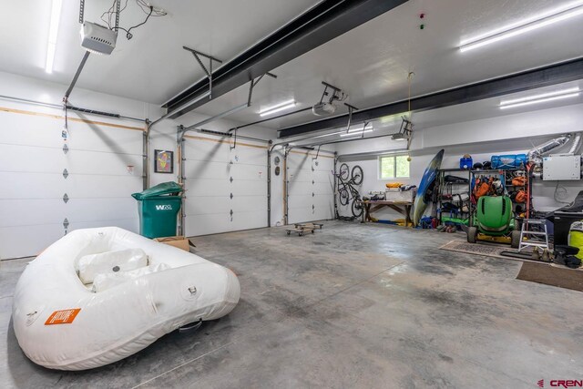 garage featuring a garage door opener