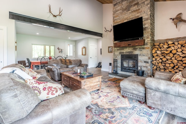 living room featuring a fireplace and hardwood / wood-style flooring