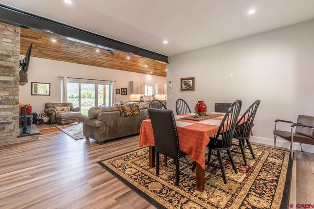 dining space with light hardwood / wood-style flooring