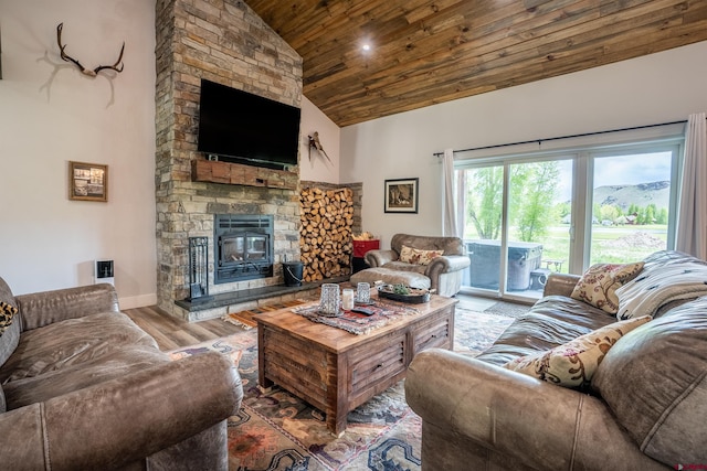 living room with wooden ceiling, a fireplace, high vaulted ceiling, and wood-type flooring