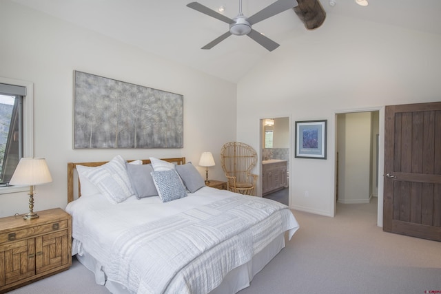 bedroom featuring light carpet, high vaulted ceiling, ceiling fan, connected bathroom, and beam ceiling