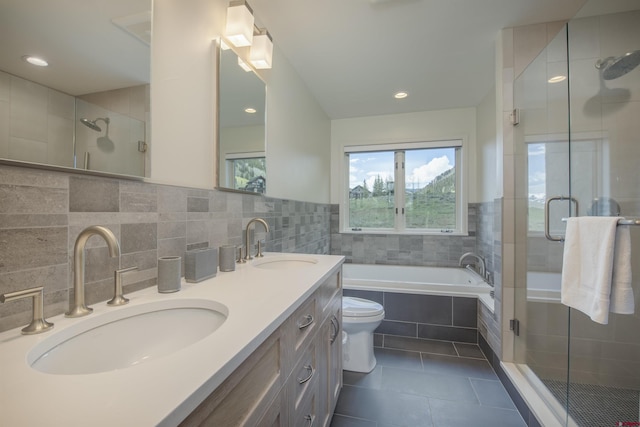 full bathroom with tile patterned flooring, vanity, toilet, and shower with separate bathtub