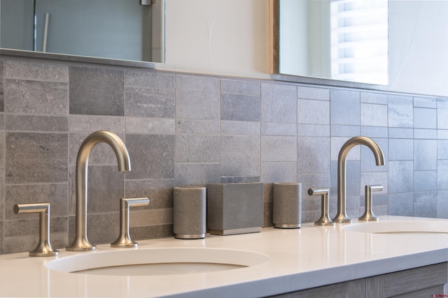 room details with decorative backsplash and vanity