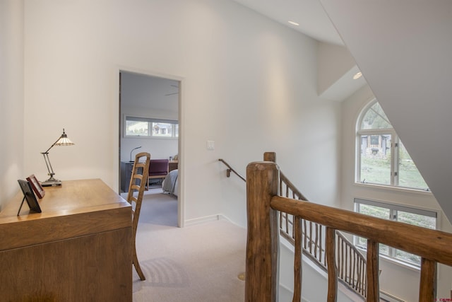 hallway with carpet