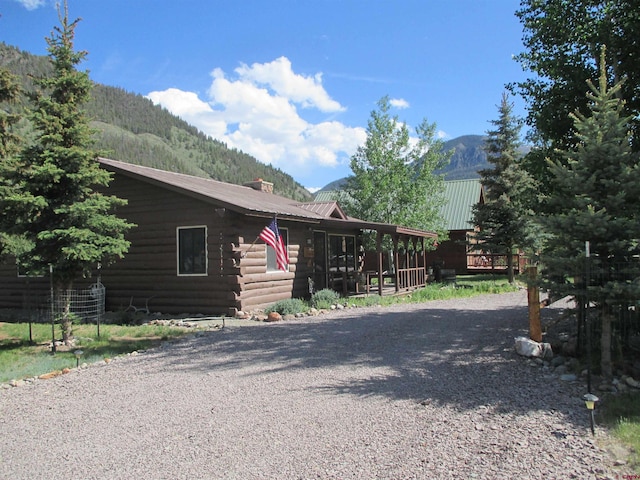 log-style house featuring a mountain view