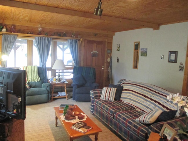 living room with beamed ceiling