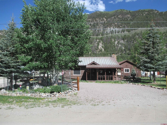 view of front of home with a mountain view