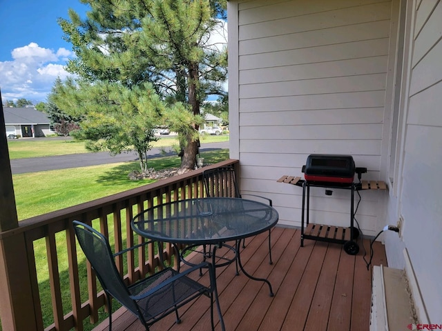 wooden terrace with grilling area