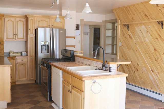 kitchen featuring a baseboard heating unit, tile flooring, an island with sink, sink, and appliances with stainless steel finishes