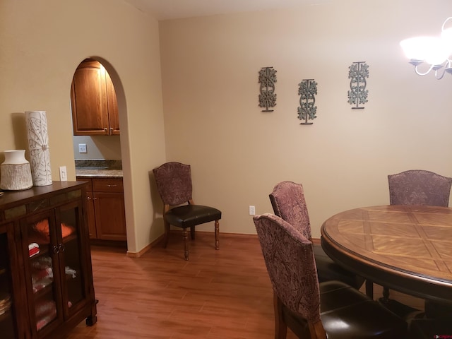 dining space with light hardwood / wood-style flooring