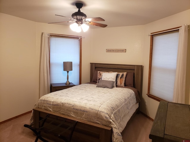 bedroom featuring ceiling fan and carpet floors