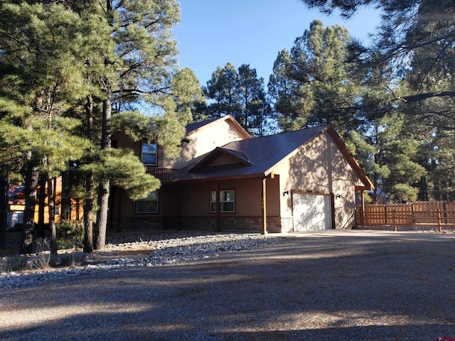 view of front of property with a garage