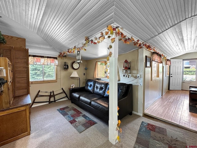 carpeted living room featuring wooden ceiling and lofted ceiling