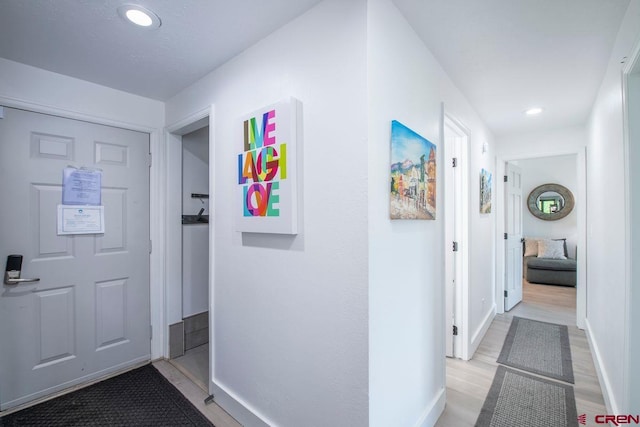 hall featuring light hardwood / wood-style flooring