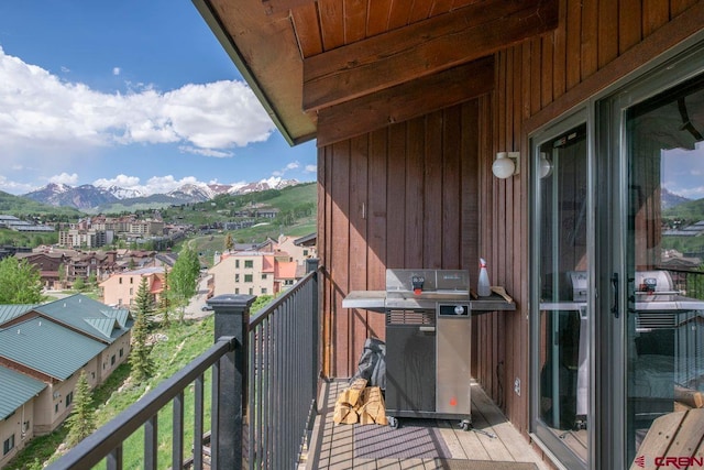 balcony featuring a mountain view