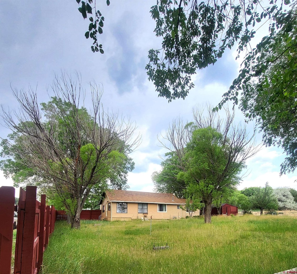 view of yard featuring fence