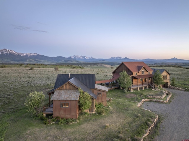 aerial view at dusk with a mountain view