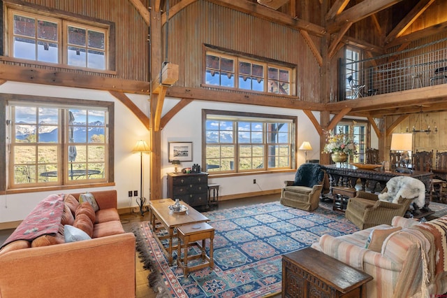 living room with a towering ceiling