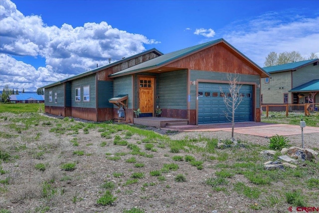 view of front of home with a garage