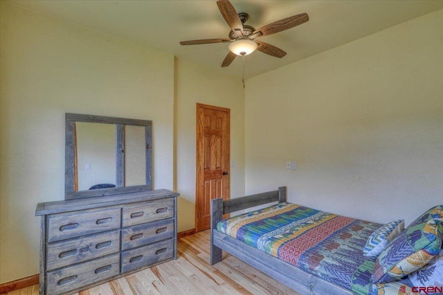 bedroom featuring ceiling fan and light wood-type flooring