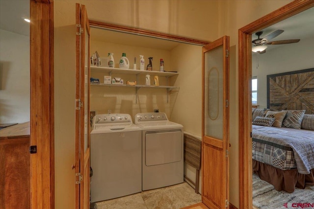 laundry area with ceiling fan and washer and clothes dryer