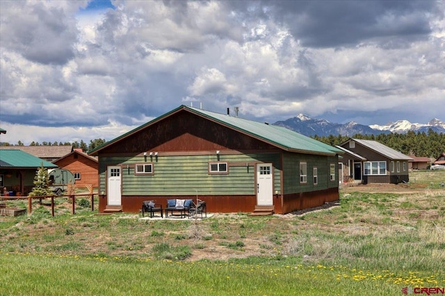 exterior space featuring a mountain view