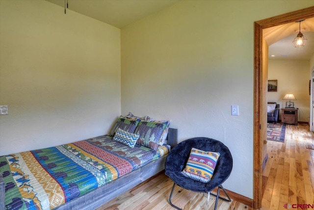 bedroom featuring hardwood / wood-style floors