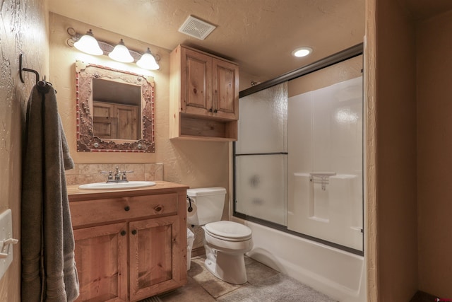 full bathroom featuring vanity, toilet, enclosed tub / shower combo, and a textured ceiling