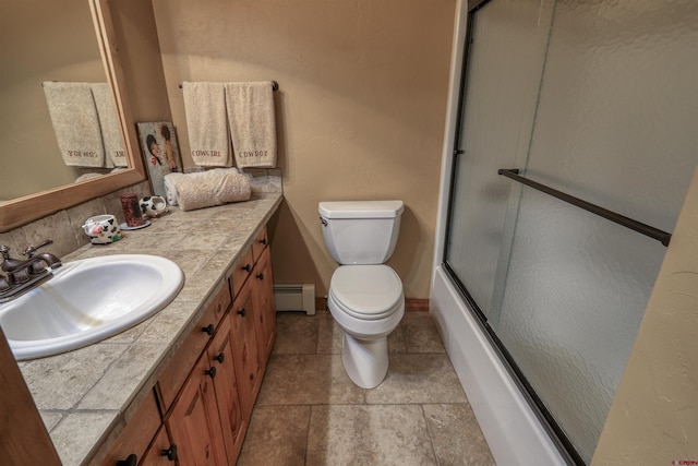 full bathroom with vanity, toilet, bath / shower combo with glass door, and baseboard heating