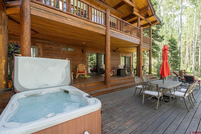 47 High Noon Ln, Telluride, CO 81435 - deck featuring a hot tub and outdoor dining space