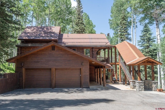 47 High Noon Ln, Telluride, CO 81435 - view of front of property with driveway and a garage
