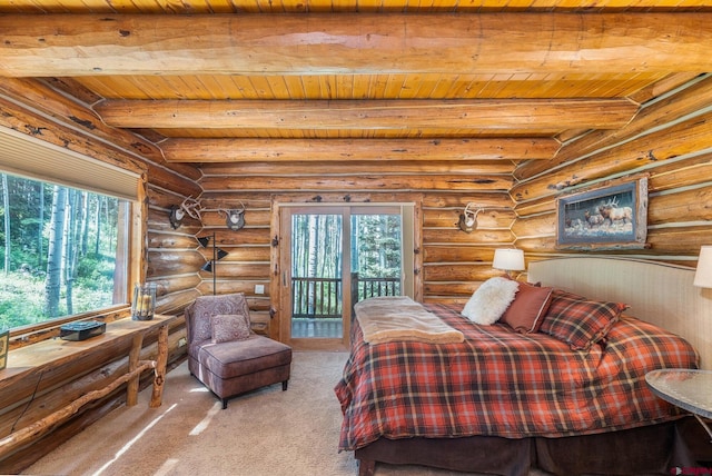 47 High Noon Ln, Telluride, CO 81435 - bedroom with a wood ceiling with exposed beams, multiple windows, carpet, and access to exterior