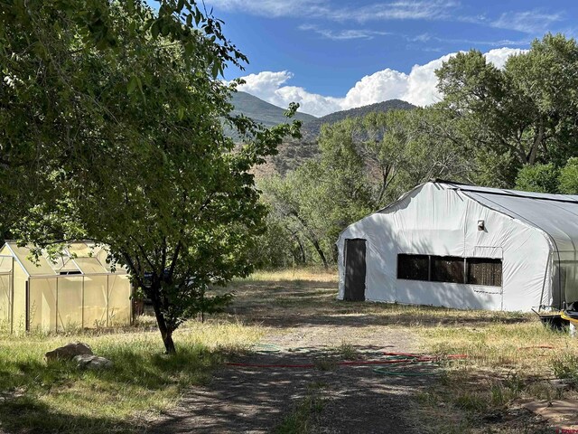 exterior space featuring a mountain view