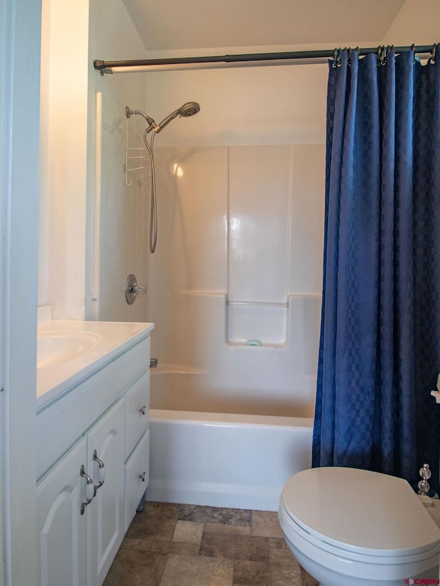 full bathroom with tile flooring, shower / bath combo, toilet, and vanity