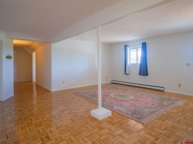 unfurnished room with baseboard heating and light parquet floors