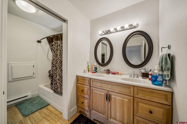 full bathroom with a sink, a baseboard radiator, shower / tub combo with curtain, and double vanity