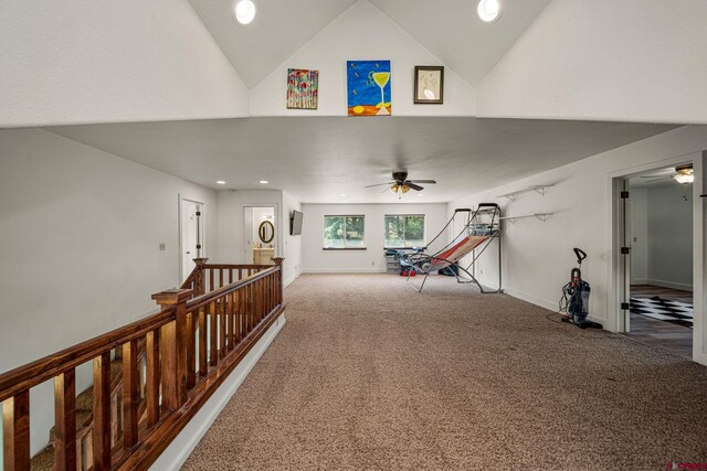 interior space with recessed lighting, high vaulted ceiling, baseboards, and carpet floors