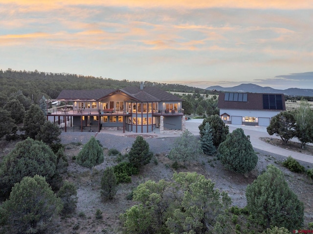 aerial view at dusk with a mountain view