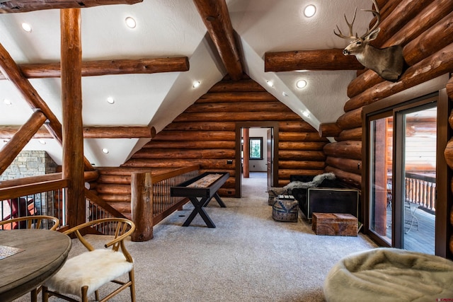 carpeted living room featuring lofted ceiling with beams and rustic walls