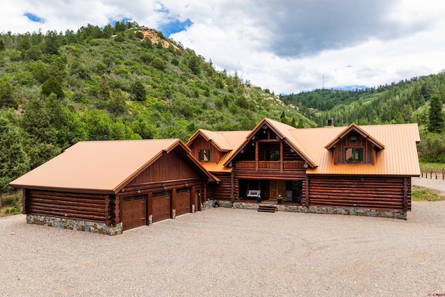 view of log-style house