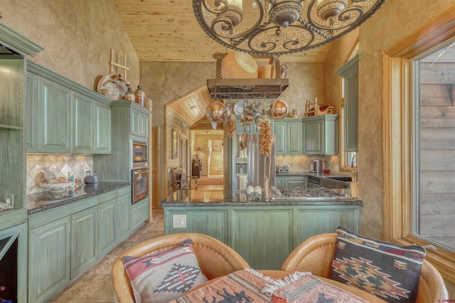 kitchen featuring green cabinets, wood ceiling, and tasteful backsplash