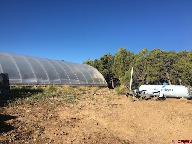 exterior space featuring an exterior structure and heating fuel