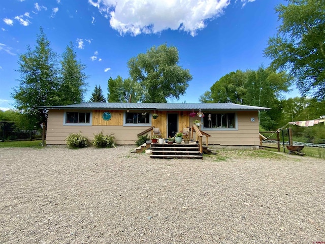 ranch-style house with a deck