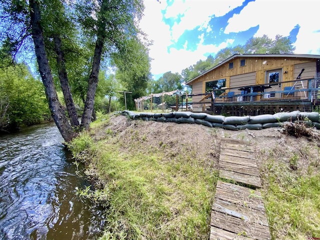 view of yard with a water view