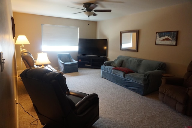 living room with carpet flooring and ceiling fan